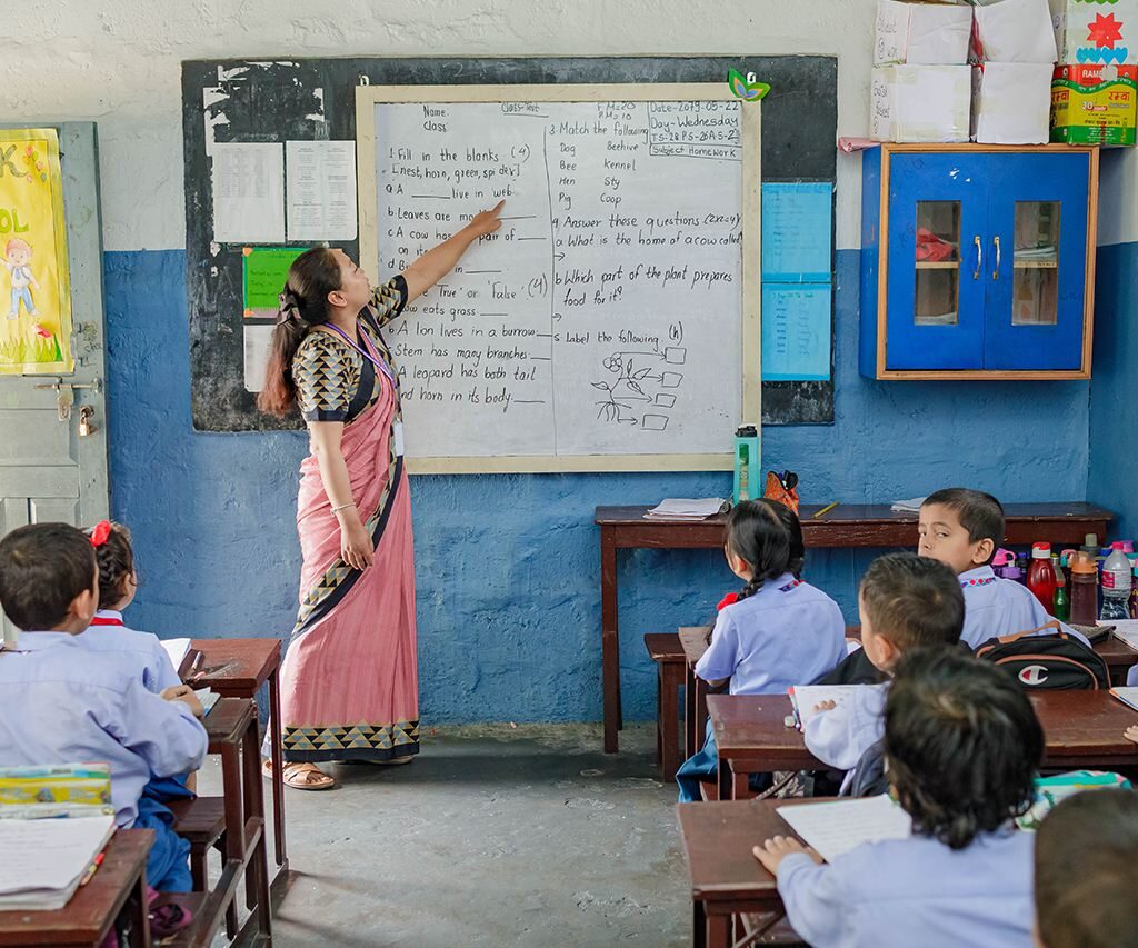 teacher teaching in classroom